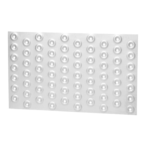 Gray metal sheet with rows of evenly spaced circular domed studs or rivets