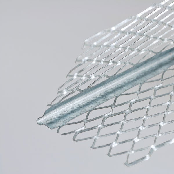 Close-up of layered plastic mesh corner guard showing the textured surface and protective design against a white background