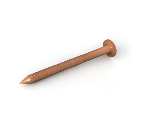 Brown copper nail with textured shaft and pointed tip on white background