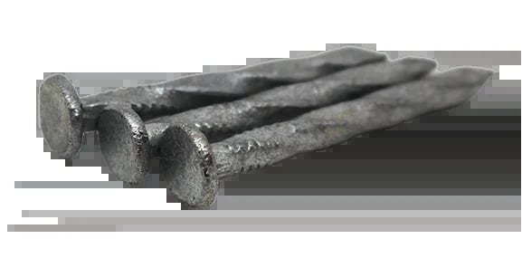Three galvanized metal nails of varying sizes arranged in a row on a black background
